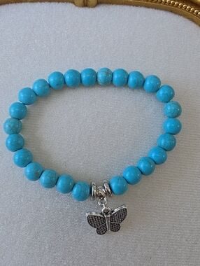 Turquoise Beaded Bracelet with Butterfly Charm